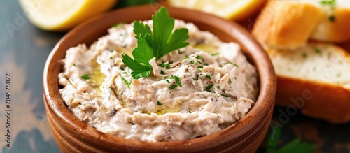 Tuna spread with cream cheese, anchovies, and bread.