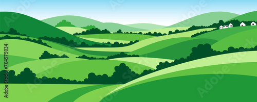 Summer panoramic landscape of green meadows and fields. Village landscape with hills  houses and trees against a blue sky. Vector illustration.
