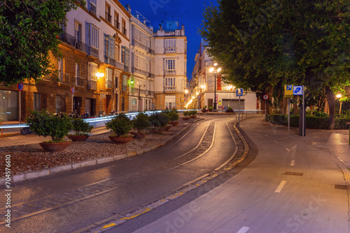 Scenic view of an old street in Cadiz at night.