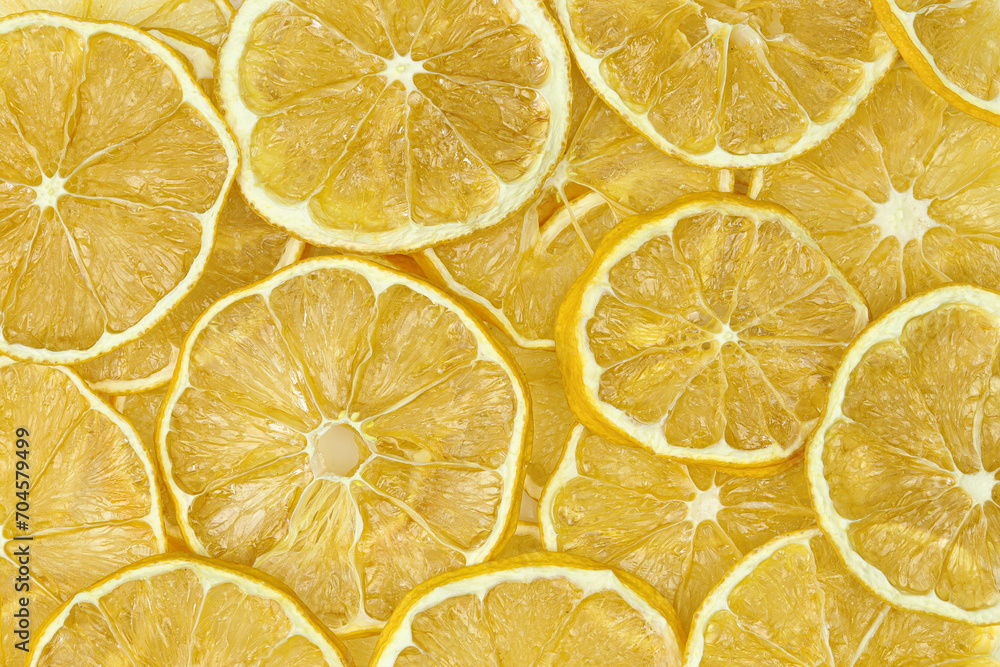 Dry lemon slices dehydrated fruit full background texture