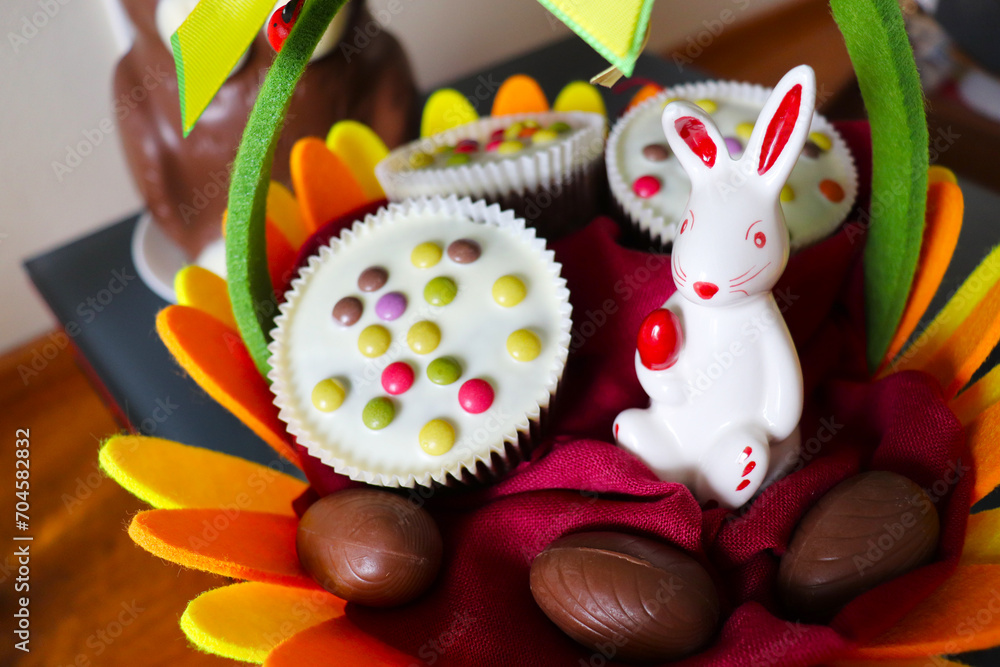 Easter card design. Easter cupcake, Easter chocolate eggs and bunny
