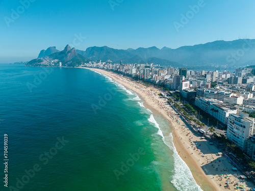 Aerial view of Ipanema beach and Leblon. People sunbathing and playing on the beach, sea sports. Rio de Janeiro. Brazil 