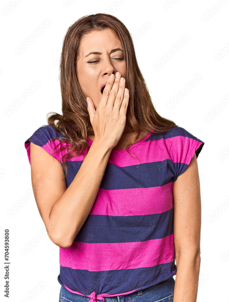 Middle-aged woman portrait in studio setting yawning showing a tired gesture covering mouth with hand. Middle-aged woman portrait in studio setting yawning showing a tired gesture covering mouth with hand.
