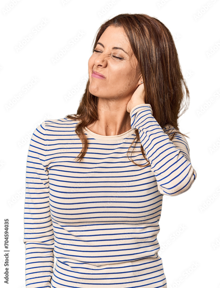 Middle-aged woman portrait in studio setting having a neck pain due to stress, massaging and touching it with hand. Middle-aged woman portrait in studio setting having a neck pain due to stress, massaging and touching it with hand.