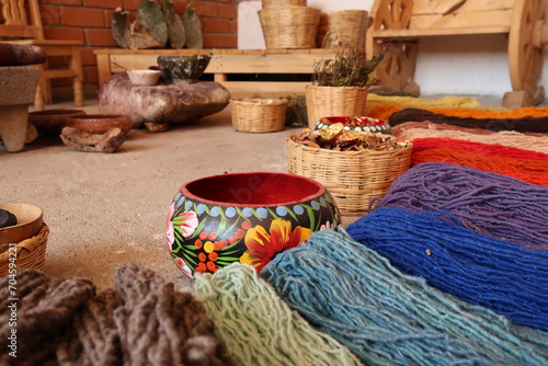 Display of natural ingredients that are needed to dye the threads for a traditional mexican carpet, Oaxaca, Mexico © anja