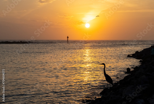 Sunset over the Gulf of Mexico and the Gulf  Intracoastal Waterway from the Nokomis side of the Venice Jetty in Nokomis Florida USA