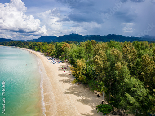 Aerial view of a beautiful sandy tropical beach and shallow, warm ocean