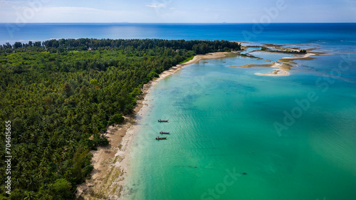 Wallpaper Mural Aerial view of a tropical beach, palm trees and traditional Longtail boats (Khao Lak, Thailand) Torontodigital.ca