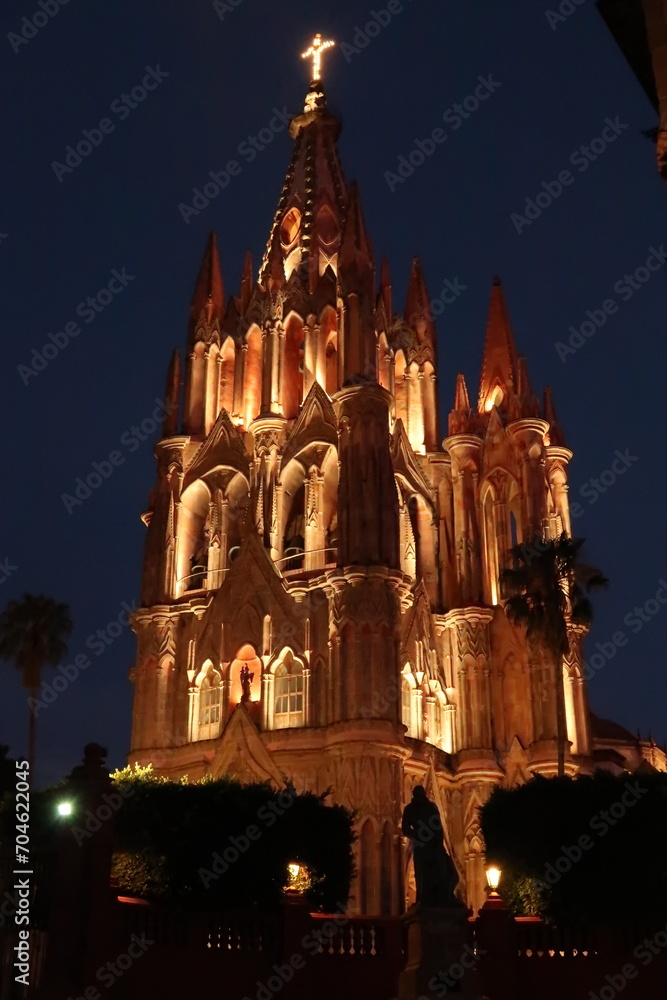 The beautiful church/cathedral Parroquia de San Miguel Arcangel in San Miguel de Allende illuminated at night, Mexico