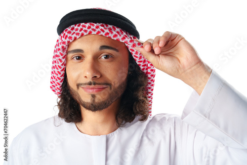 Portrait of a young Arab man wearing middle-eastern traditional dress thobe isolated on white photo