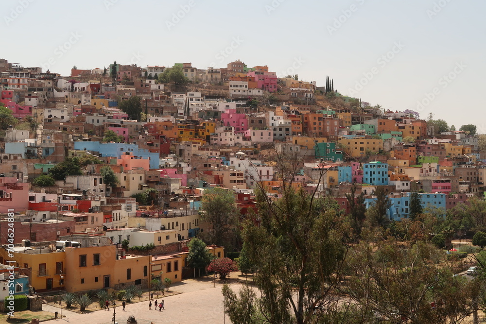 Beautiful Pastitos park and the colorful houses of the neighbourhood right behind it, Guanajuato, Mexico