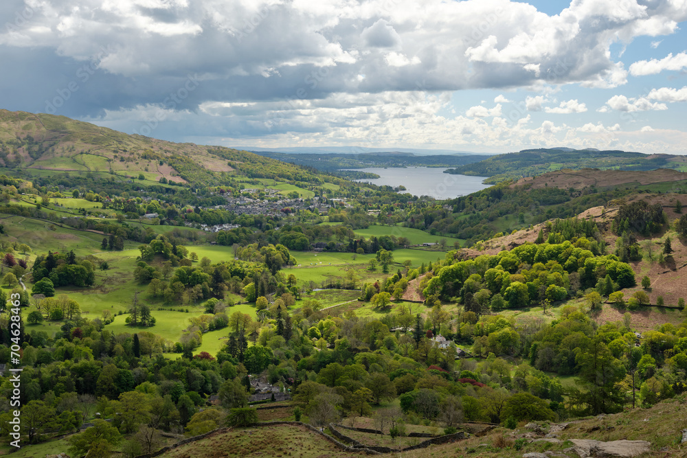 Ambleside and Windermere in the sun seen from the slopes of Nab Scar, Lake District, UK