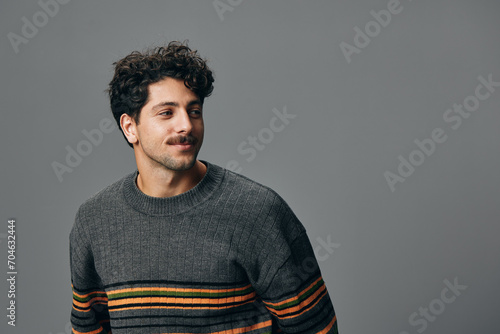Positive man hispanic fashion person portrait trendy hipster sweater handsome face style smile copyspace photo