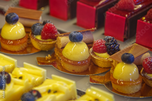 Varation of different kind of pastries in beautiful colors photo