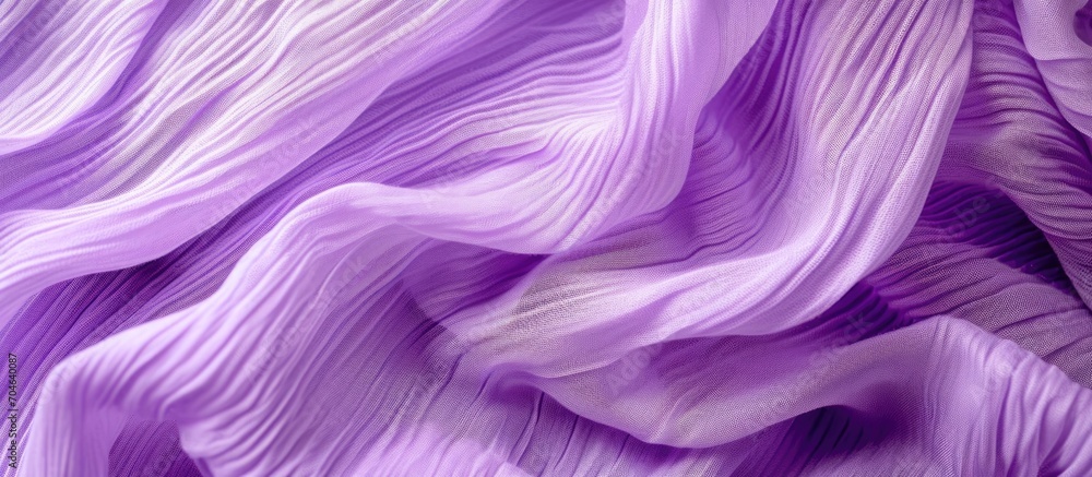 Striped fabric texture in violet from a crumpled material. Striped fabric texture in violet from a crumpled material.
