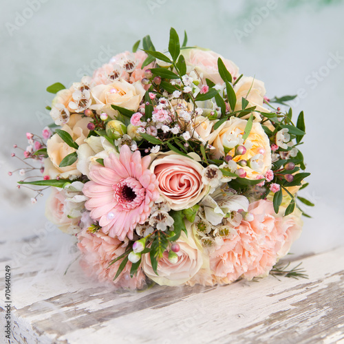 Close Up of a Muted Wedding Bouquet with Pink Flowers.