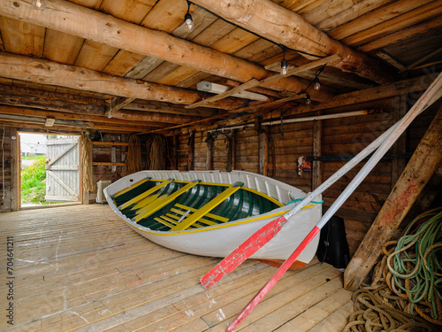 Obraz na plátně A Punt Style rowboat inside a boathouse on Joe Batt's arm on Fogo Island Newfoun