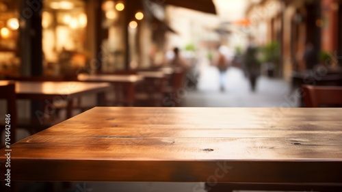 Empty wooden table, outdoor restaurant and cafe, ready for packshot of food, table and street background