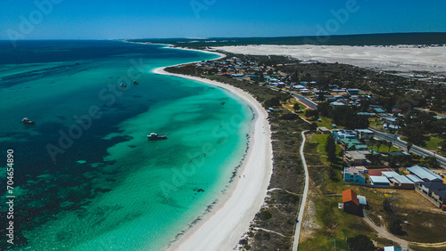 Beautiful aerial view of turquoise ocean and white sandy beach on coastline of Lancelin - Western Australia.