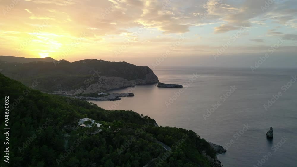 Island villa Ibiza Mountain Sunset colorful. Majestic aerial view flight drone Island villa Ibiza Mountain Sunset colorful. Majestic aerial view flight drone