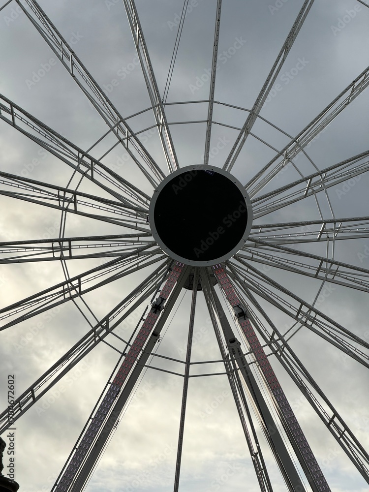 elements of a large ferris wheel in the city square