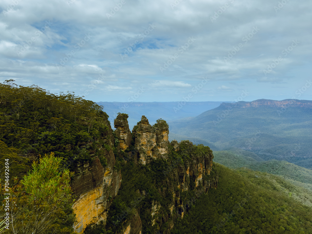 Naklejka premium The serene Blue Mountains and Majestic Waterfalls. Nature's Symphony. NSW. Australia. Minnehaha falls. Three sisters.