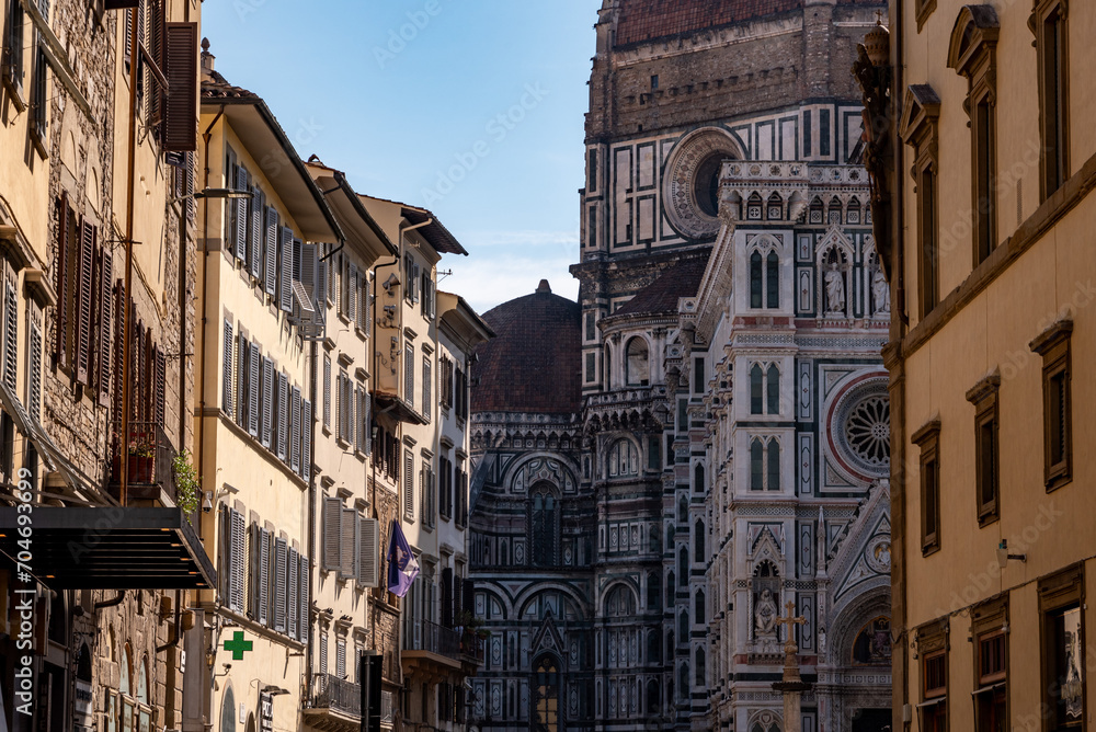 The cathedral Santa Maria del Fiore in Florence, seen from a street further away