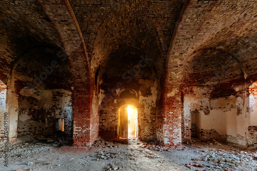 Hall of old ancient abandoned red brick ruined historical building
