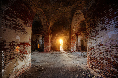 Hall of old ancient abandoned red brick ruined historical building