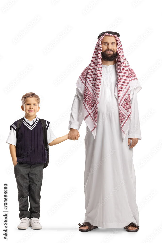 Full length portrait of a saudin arab man holding holding a schoolboy with hand