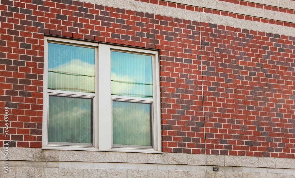 urban brick building, symbolizing stability and growth in commercial real estate urban brick building, symbolizing stability and growth in commercial real estate