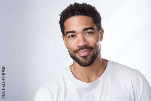 Portrait of handsome young african american man in white t-shirt