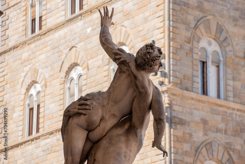 Statue of the Rape of the Sabines from artist Gimabologna in the Loggioa dei Lanzi in Florence photo