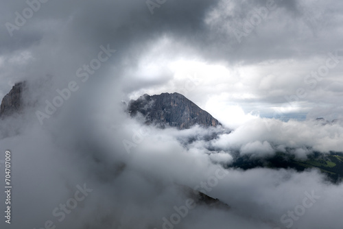 Mountains early morning through dense clouds. © Sameer