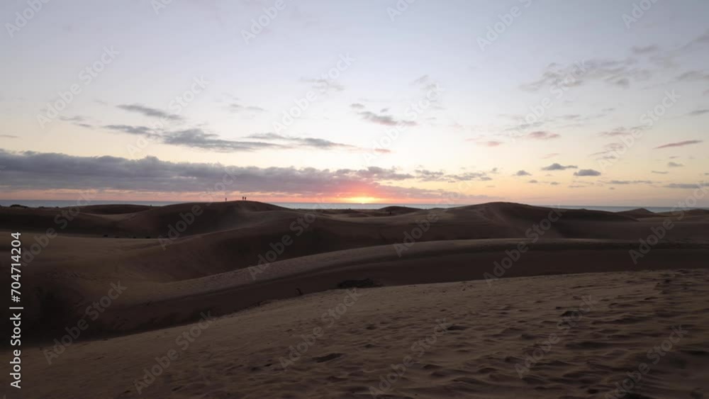 Time lapse, sunrise in the nature reserve Dunes of Maspalomas, Gran Canaria, Canary Islands Time lapse, sunrise in the nature reserve Dunes of Maspalomas, Gran Canaria, Canary Islands