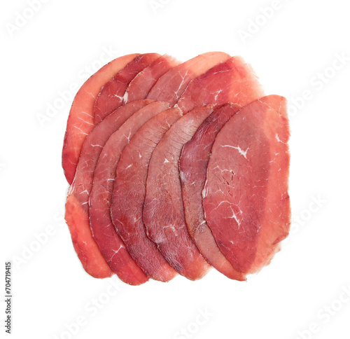 Slices of tasty bresaola isolated on white, top view