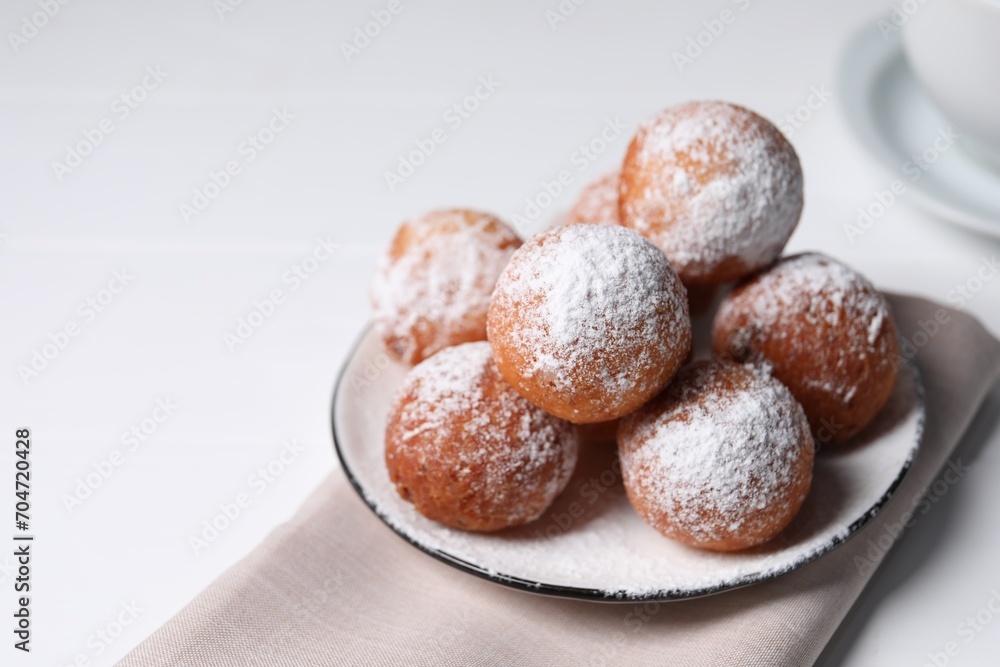 Delicious sweet buns on white table, closeup. Space for text