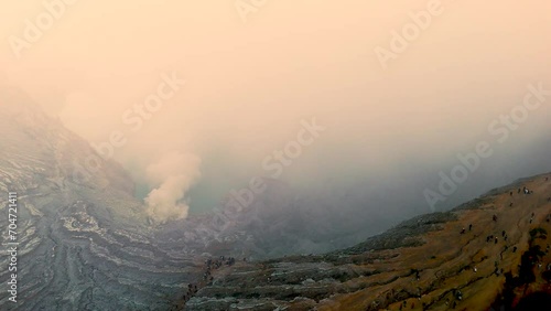 Mount Ijen crater couldron hot green lake top mountain scenery landscape Banyuwangi Indonesia photo