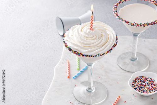 Murais de parede Birthday cake martini cocktail topped with whipped cream and a candle