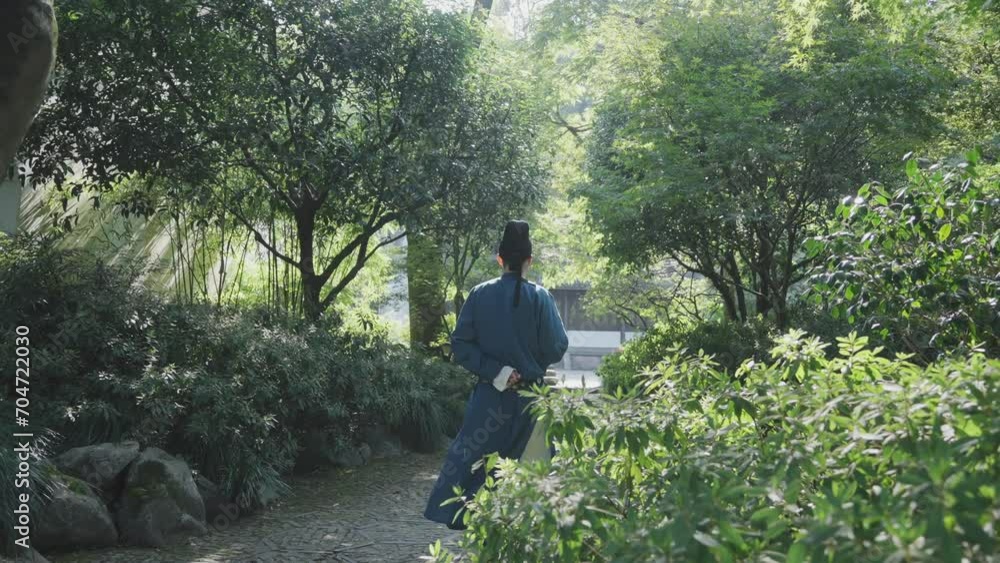 people in ancient costume walking in garden people in ancient costume walking in garden