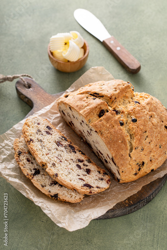 Irish soda bread sliced on a board, traditional recipe photo