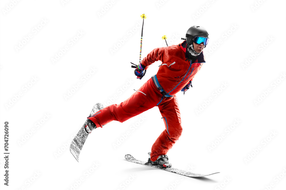 Obraz premium Skis. Skiing Man in action. In action. Sportsman in a red ski suit. Driving at high speed. Sport emotion. Skiing sport. Isolated