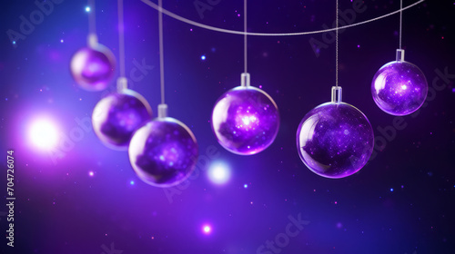 A collection of purple Christmas balls hang from a string  creating a festive and cosmic ambiance.