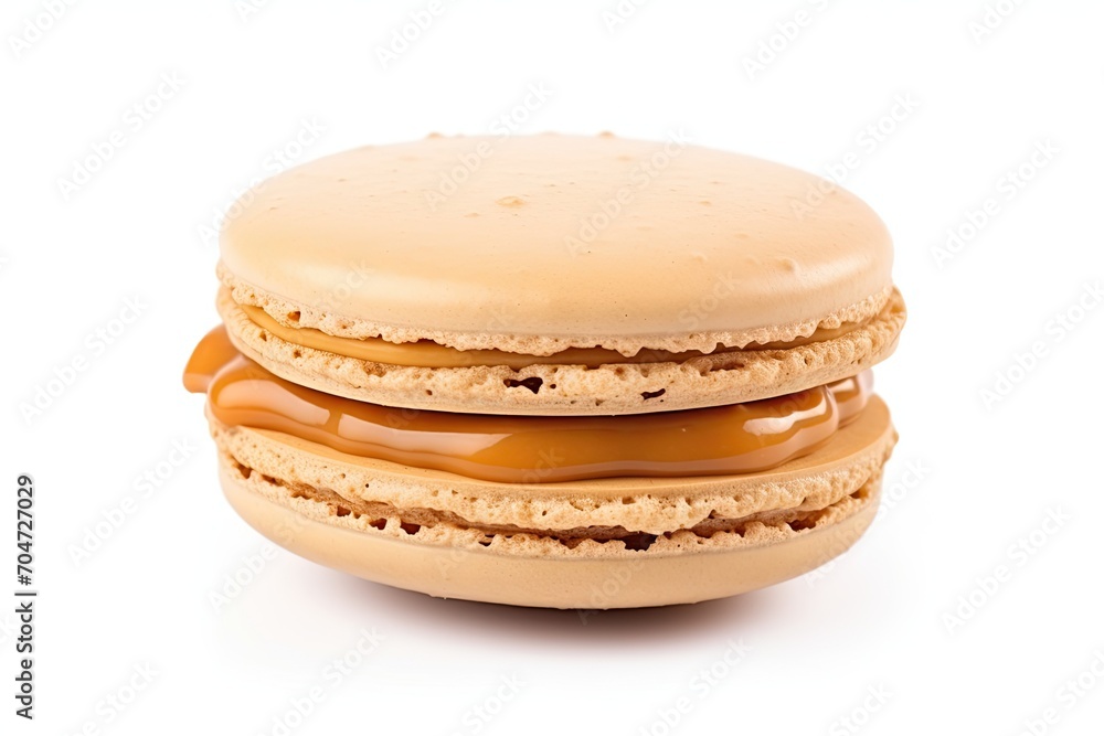 Isolated Dulce de Leche Macaron Cookie on White Background Isolated Dulce de Leche Macaron Cookie on White Background