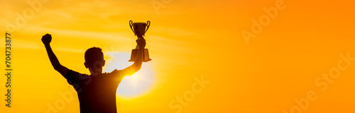 Banner Winner win hands holding golden champion trophy cup prize. Silhouette best award victory hands champion trophy . Panorama Team holding gold sport trophy cup. Win-Win sport team with copy space