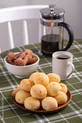 Boho Breakfast table. Typical Brazilian breakfast. Pão de Queijo. Black Coffee. Butter toast. Granola.