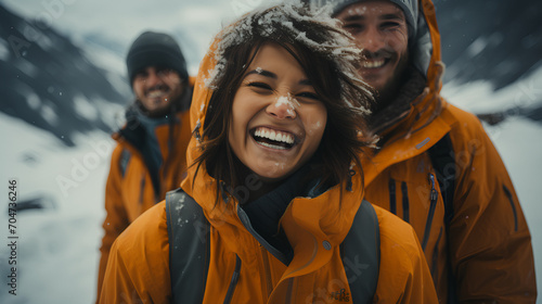 Attractive in stylish winter clothes in the snow - low angle close-up shot - vacation - getaway - mountains - skiing - holiday - escape - honeymoon - Alaska 