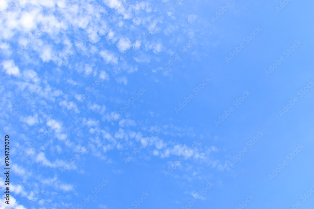 beautiful blue sky and white fluffy group of clouds in the morning, natural background