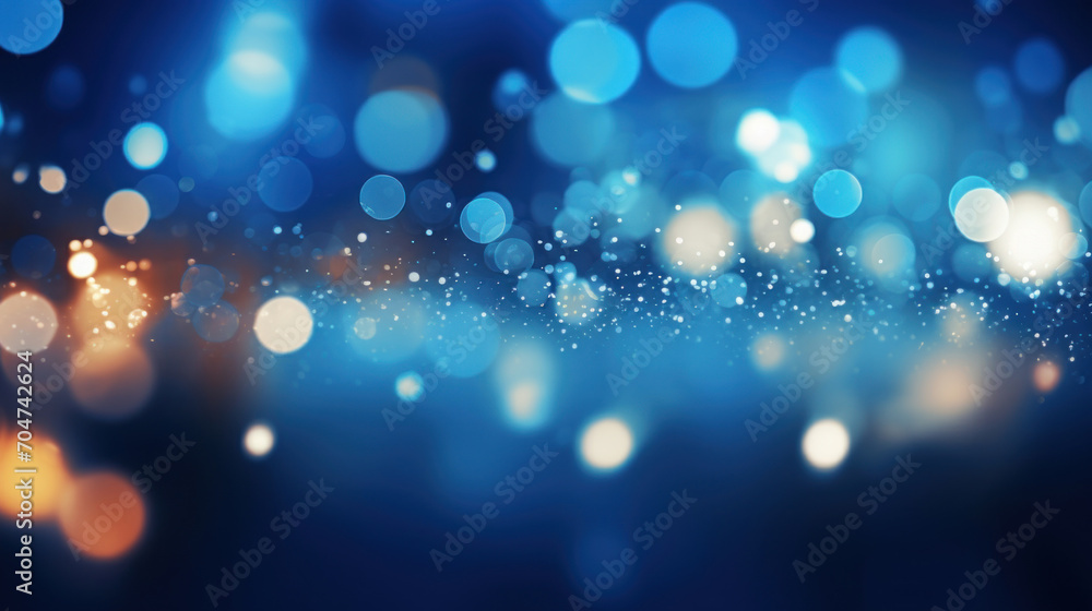 An abstract background of blue bokeh lights, creating a tranquil and dreamy atmosphere with delicate light particles.