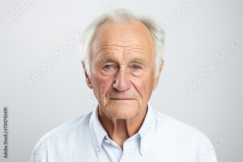 Portrait of a senior man. Isolated on white background.